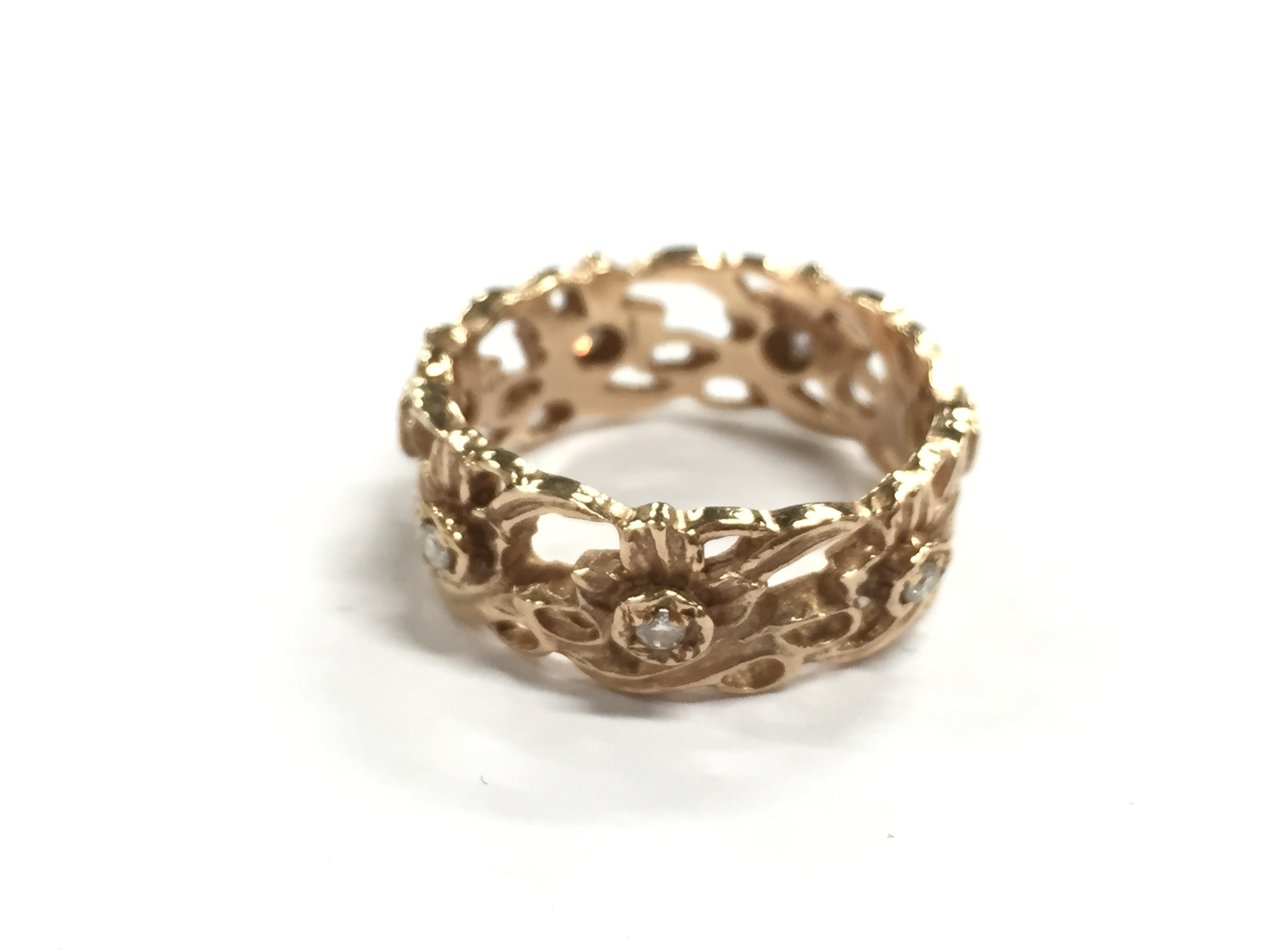 A 14 carat Welsh gold eternity ring designed by Stuart Devlin, a circle ...