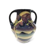 WESTERN ISLES: A twin handled Moorcroft Pottery vase by Sian Leeper (17.5cm high).