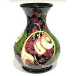 QUEEN'S CHOICE: A large Moorcroft Pottery vase by Emma Bossons (23cm high).