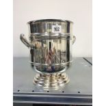A Christofle silver plated twin handled champagne bucket