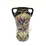 SWEET AMARYLLIS: A twin handled Moorcroft Pottery vase by Kerry Goodwin (18cm high).