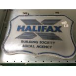 A cast metal Halifax Building Society sign in grey and blue.