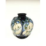 SNOWSTORM: A Numbered Edition signed Moorcroft Pottery vase by Rachel Bisho (10cm high).