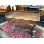 A Victorian mahogany tray back washstand fitted with two drawers with turn bulbous supports,