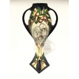 FLEUR DE LUCE: A Limited Edition 46/150 twin handled signed Moorcroft Pottery vase by Emma Bossons,