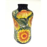 ORANGE FLOWERS: A Trial Moorcroft Pottery vase dated 25.4.02 (20cm high).