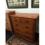 A Victorian mahogany straight front chest of drawers fitted two short and three long drawers and