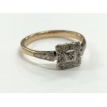 A yellow metal Art Deco design diamond set old cut ring.