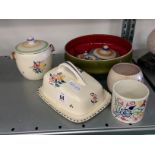 A Poole Pottery Delphis design bowl, shape 89 together with a Poole Pottery traditional butter dish,