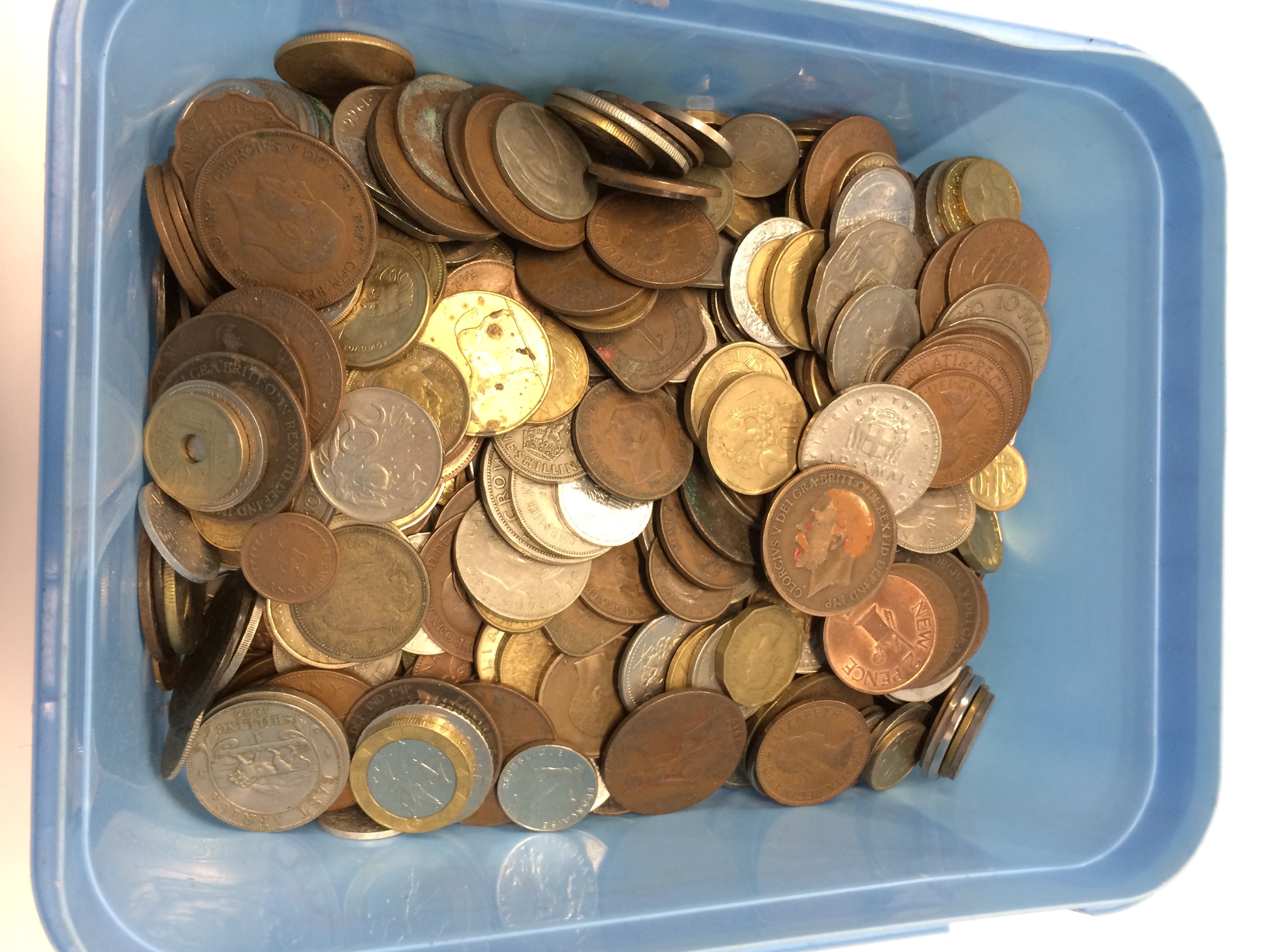 A tub of various coins.