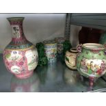 A pair of Chinese green glazed kylins,