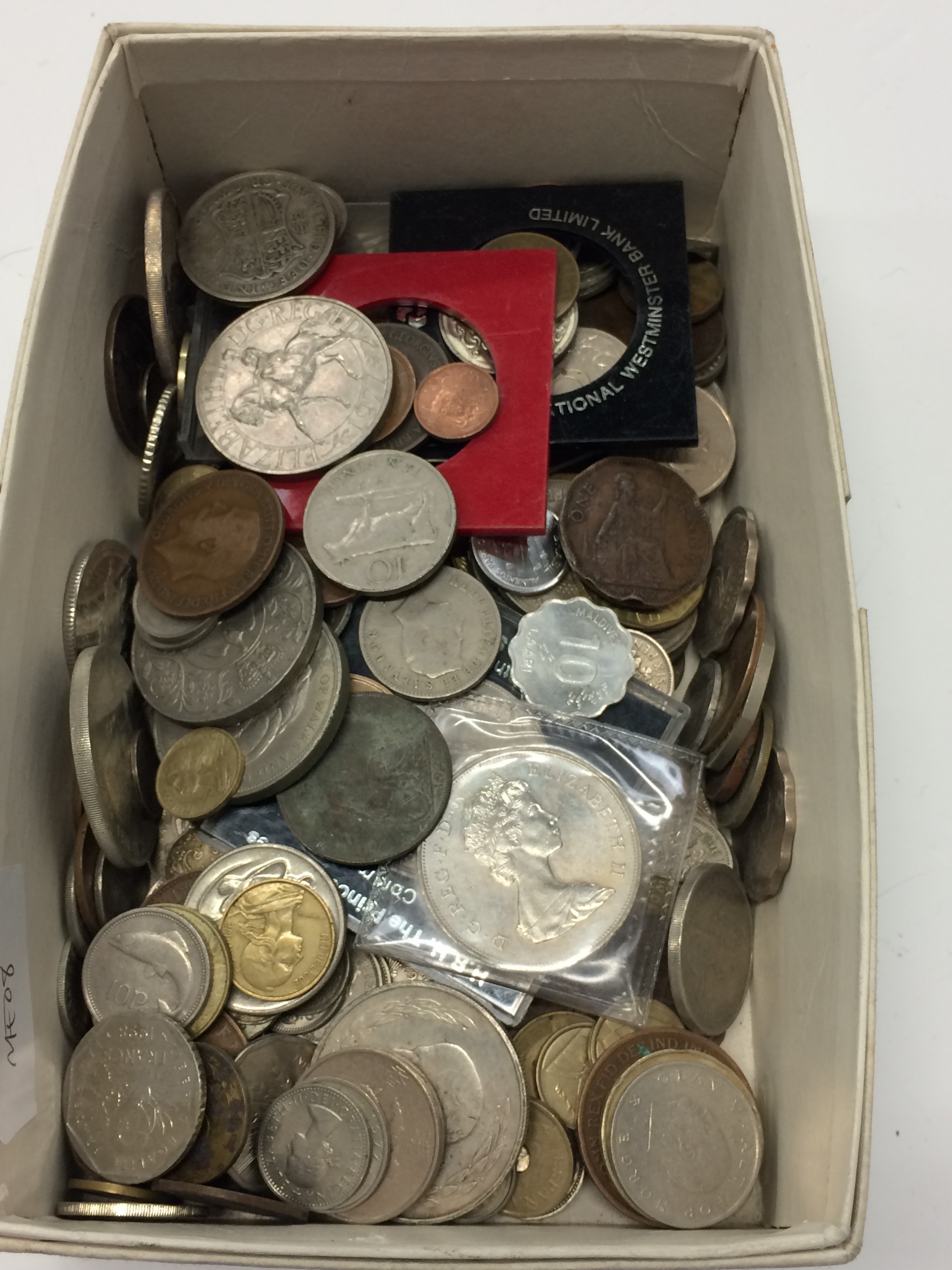 A box of various coins.