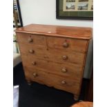 A Victorian North country pine straight front chest of two short and three long graduated drawers,