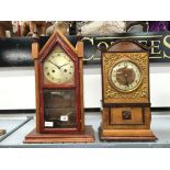 An early 20th century large oak cased mantle clock together with another.