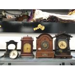 Four various mantle clocks.