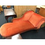 A Victorian walnut framed right hand side chaise longue with carved decoration,