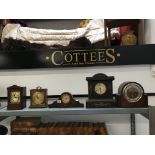 Five various mantle clocks.