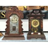 A late 19th century carved oak cased American mantle clock with glass front by the Ansonia Clock Co.