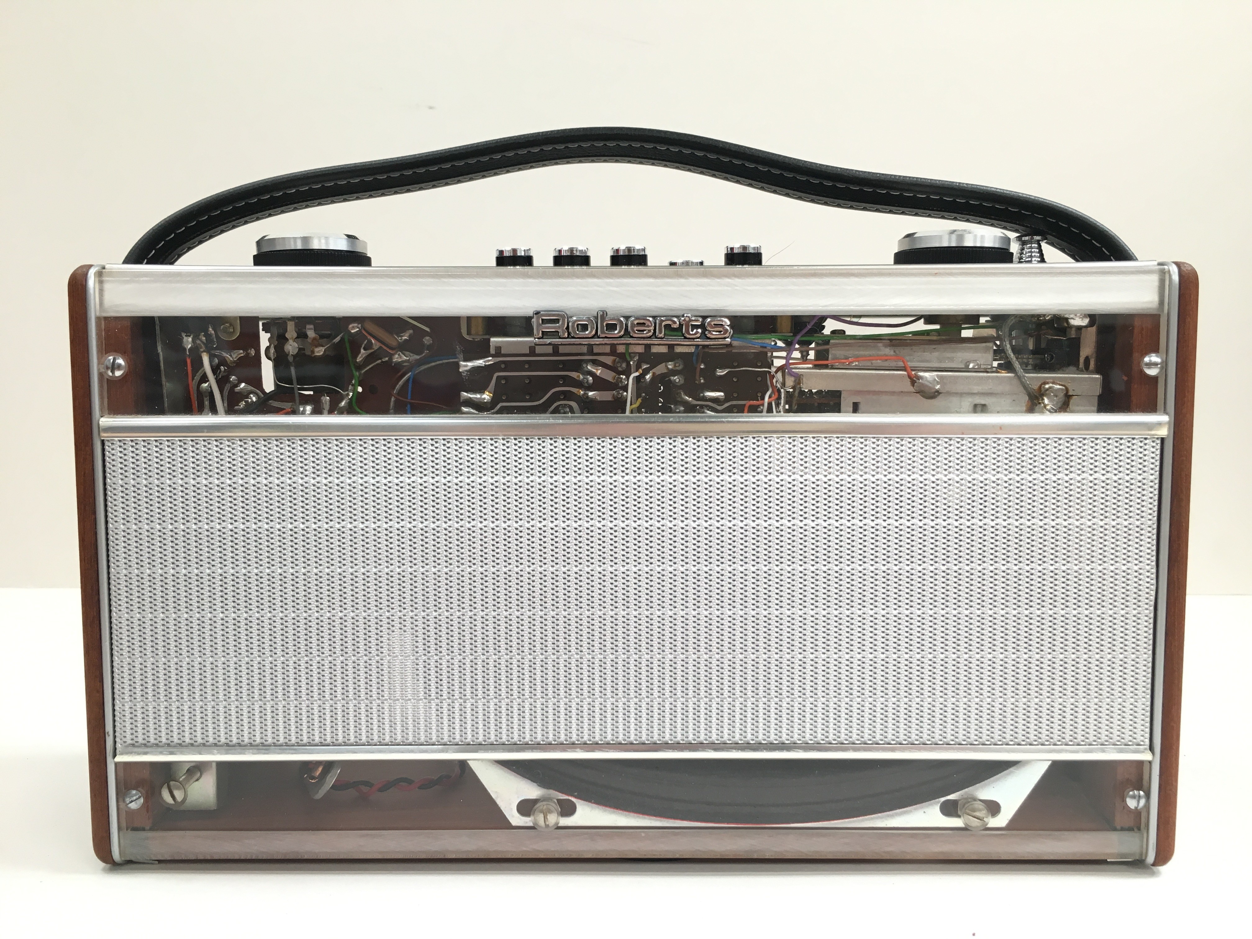 A rare Roberts Radio, Model 600 with silver mesh grille, five push buttons, two tuning knobs,