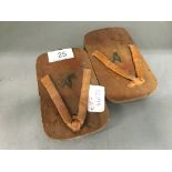 A pair of Japanese child's wooden sandals.