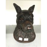 A full size Bavarian style carved wood storage jar modelled as a dog's head with chain collar.