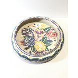 A large Carter ,Stable,Adams Bowl shape 493) decorated in a floral design painted by Vera Bridle.(