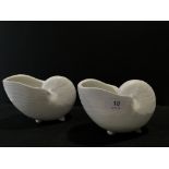 A pair of Poole Pottery bone china white glazed Nautilus shell vases, circa 1980's, manufactured