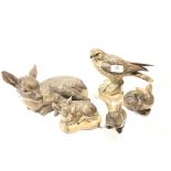 A Barbara Linley Adams stoneware model of a large Fawn together with a Merlin, baby fawn and two