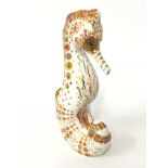 A Royal Crown Derby bone china paperweight: Swirl Seahorse, 2010, gold stopper, signed markings to