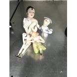 Four various Art Deco style china figurines and half dolls.
