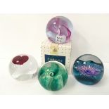 Four various Caithness art glass paperweights: Sweetheart, Streamers, Petunias and Sea Gem.