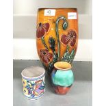 A Poole Pottery vase by Alan White, decorated with poppies together with a miniature Poole Pottery