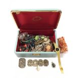 A box of white metal and other costume jewellery to include a silver coin bracelet.