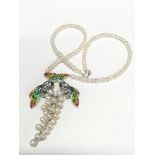 A Silver and freshwater Pearl reproduction Art Nouveau plique a jour enamel necklace.