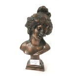 A cast metal bust modelled as a classical female figure.