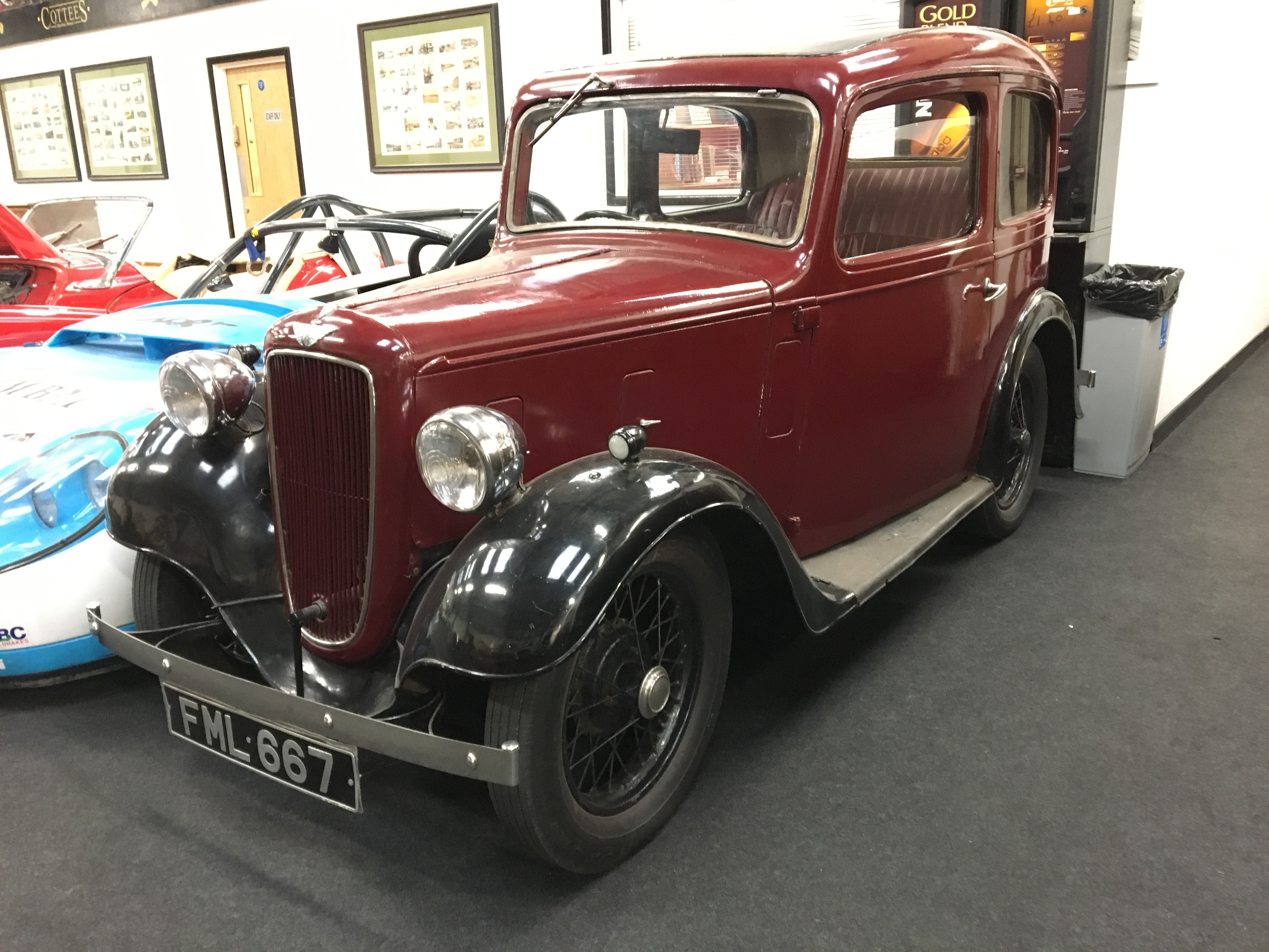 A vintage Austin Ruby 7 Historic vehicle in a maroon colour, First registered in 1937 this vehicle