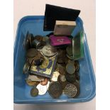 A box of mixed foreign and used coins.