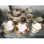 The residue of a Royal Albert bone china dinner and tea set decorated in the Old Country Roses