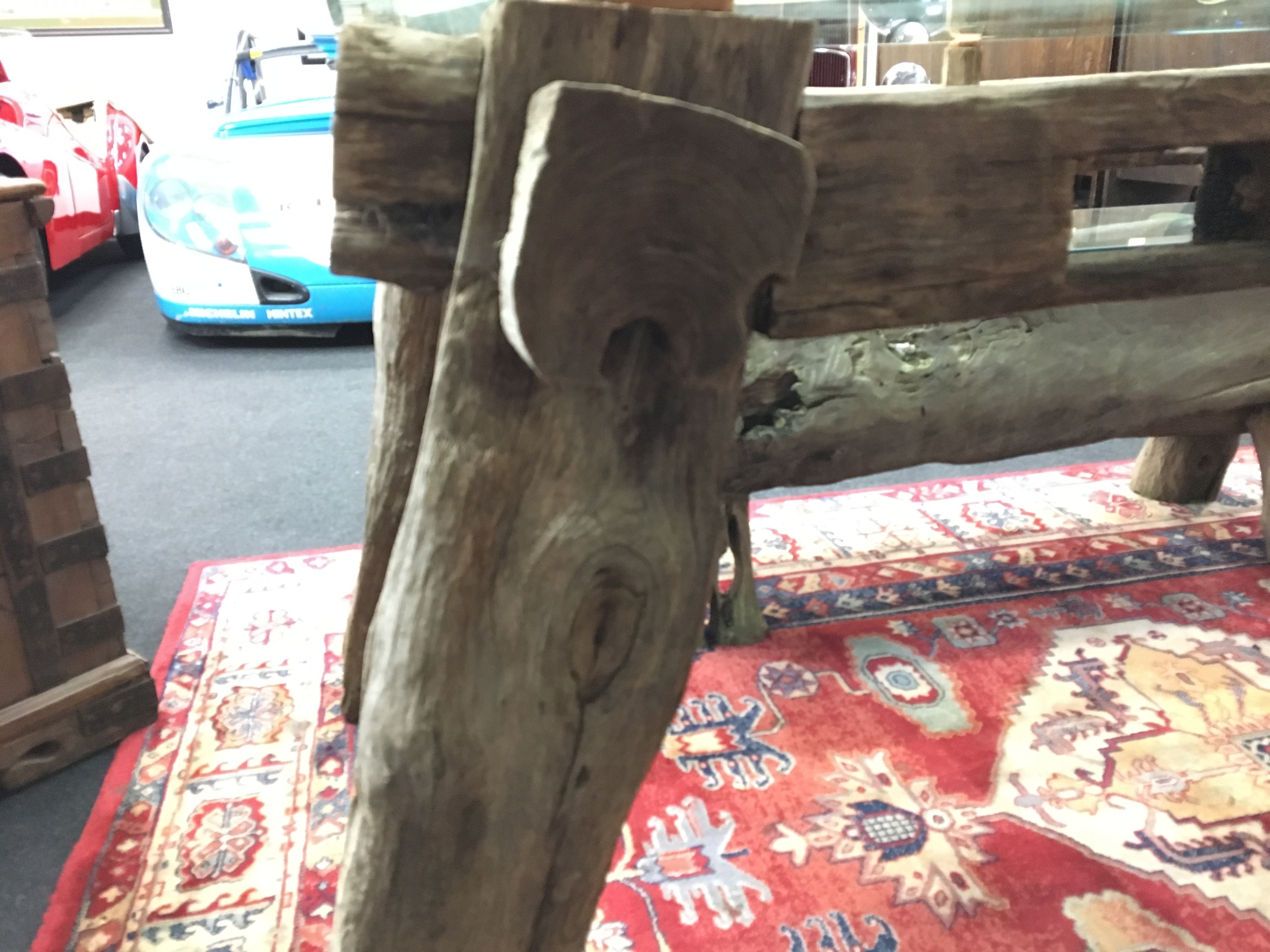 A glass topped coffee table resting on oak frame supports, made from old oak beams. - Image 2 of 2