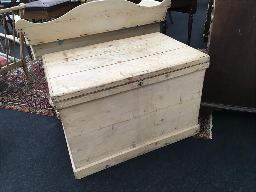 A 19th century large pine storage box with metal drop handles to sides.