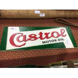 A cast iron Castrol motor oil reproduction advertising sign.