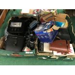 Two boxes containing a large collection of vintage and modern cameras and binoculars to include a