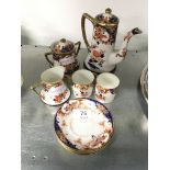 The residue of a Noritake gilt and transfer decorated coffee set comprising:- coffee pot, sugar