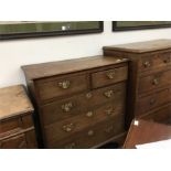 A 19th century oak chest of drawers, two small drawers over three large drawers with brass drop