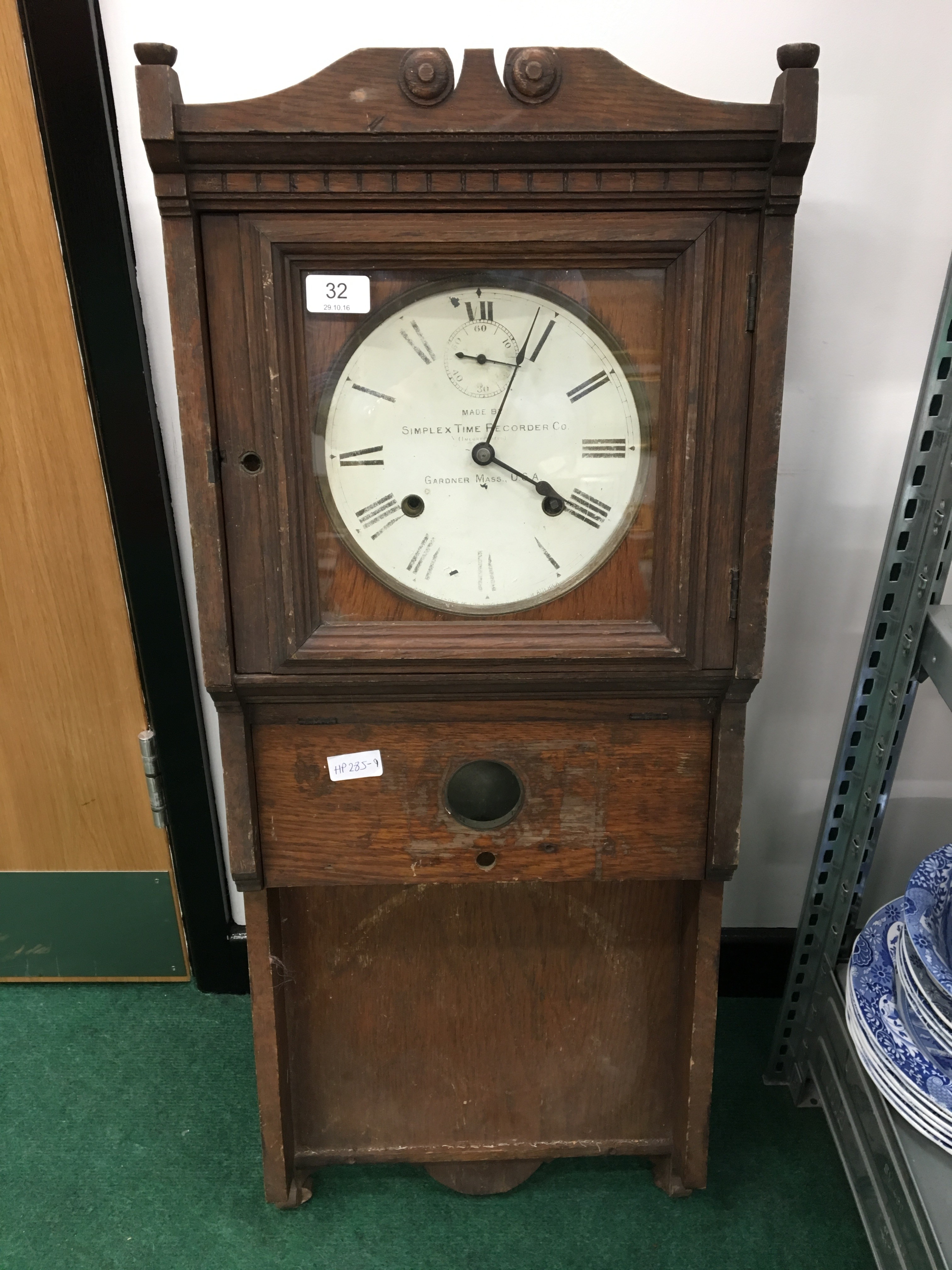 Early 20th century oak cased wall clock by Simplex Time Recorder Co, Gardener Mass, USA.