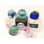 Five various glass Caithness paperweights.