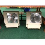 A pair of cream painted late 20th century aluminium cased stage lights by Strahlertechnik.