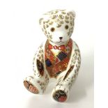 A Royal Crown Derby bone china paperweight modelled as a teddy bear decorated in the Imari