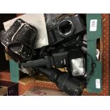 A box containing vintage cameras to include a Praktica Super TL1000 camera body with Optomax 1:5.6