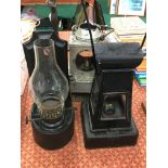 An early 20th century grey painted National British Rail railway lamp together with two black